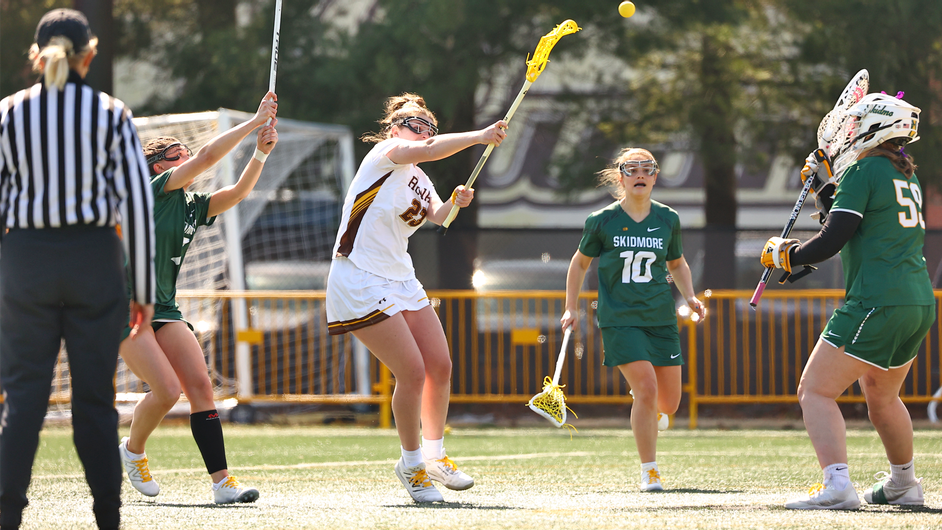 Elaina Corson fires a shot at the net. Corson tied for the team-lead with four goals against Clarkson. - Photo via Rowan Athletics