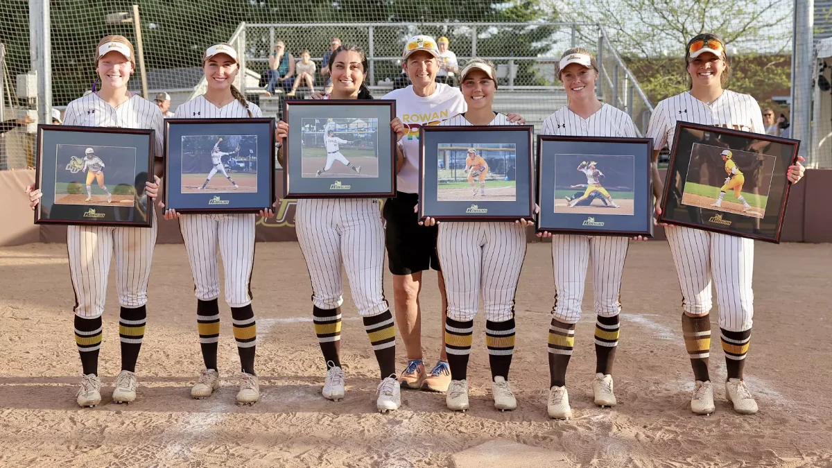 (Left to right) Seniors Maeve Lougheed, Rylee Lutz, Makayla Veneziale, Breanna Bryant, Liz McCaffery, and McKenzie Melvin get honored postgame. - Photo via Rowan Athletics